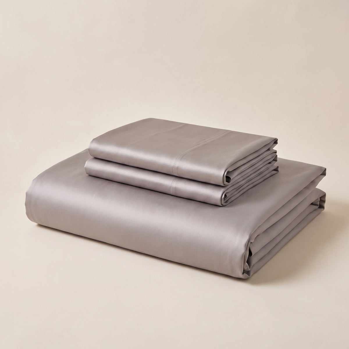 Smoke Satin Sheet Set — folded stack