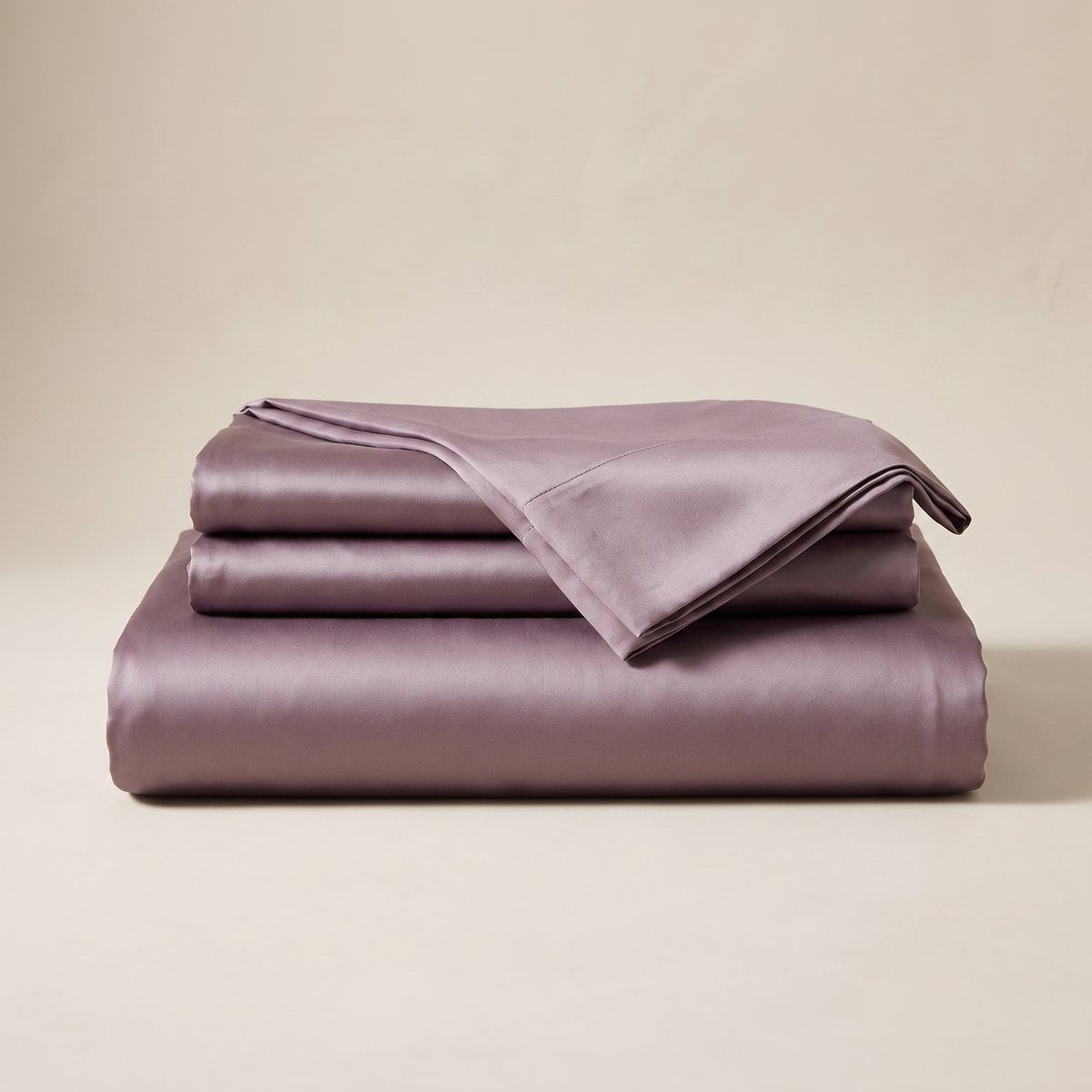 Dusk Satin Sheet Set — folded stack