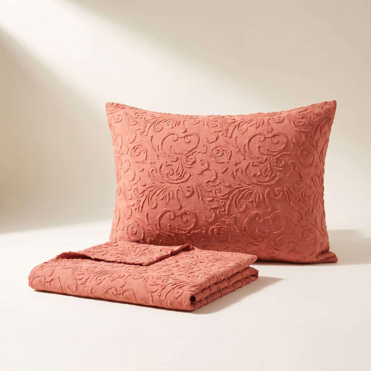 Signature Pillowcases in Coral, warm coral with a raised damask, set of 2