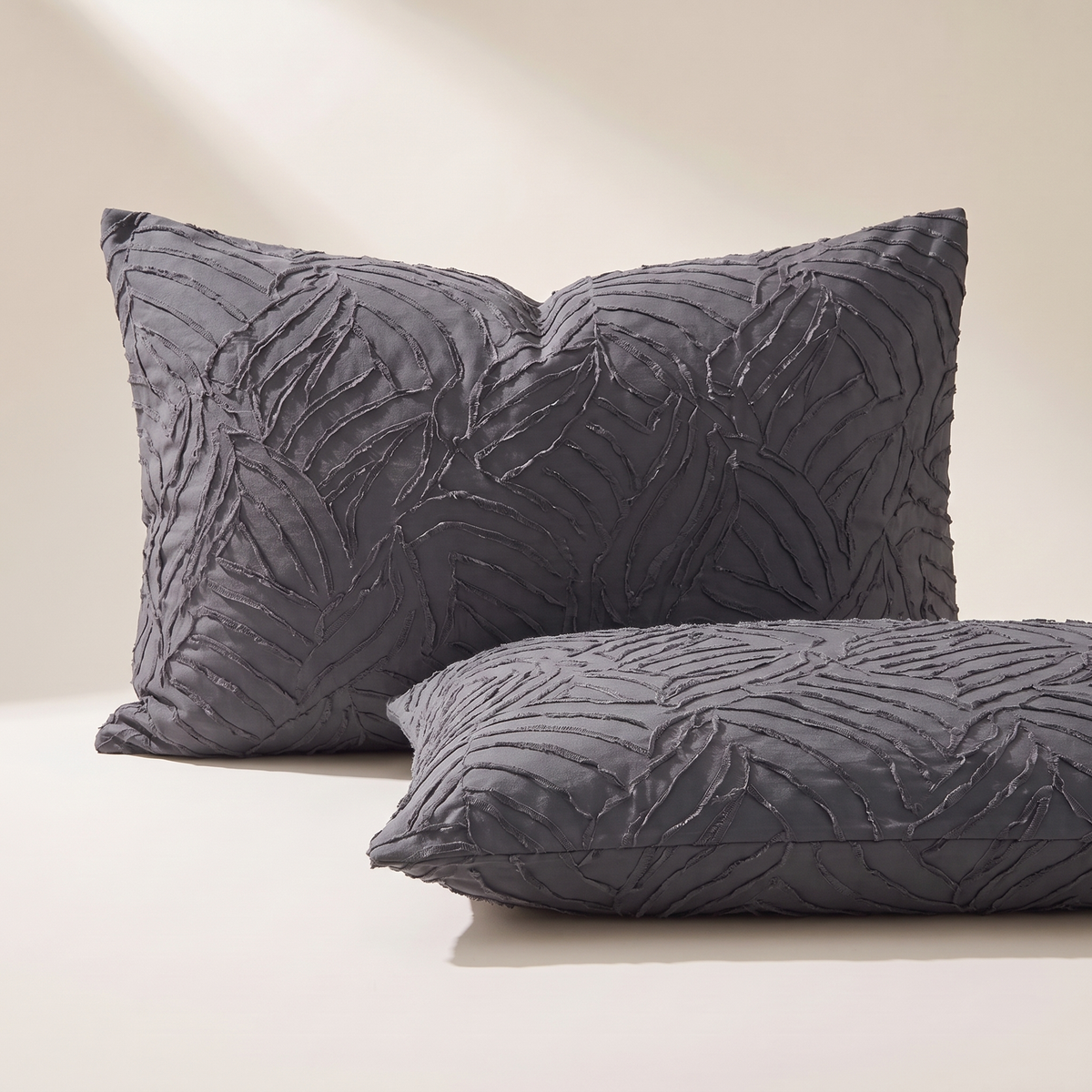 Signature Pillowcases in Obsidian, near-black with a tufted chevron, set of 2