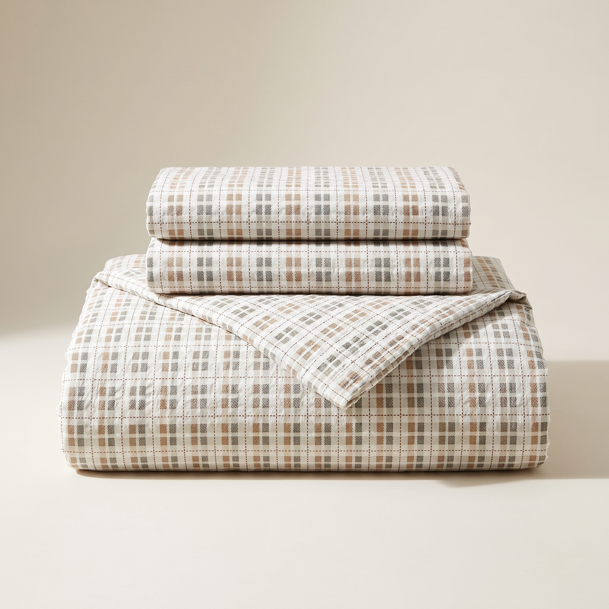 Saffron Duvet Cover Set, folded stack, camel and cream gingham