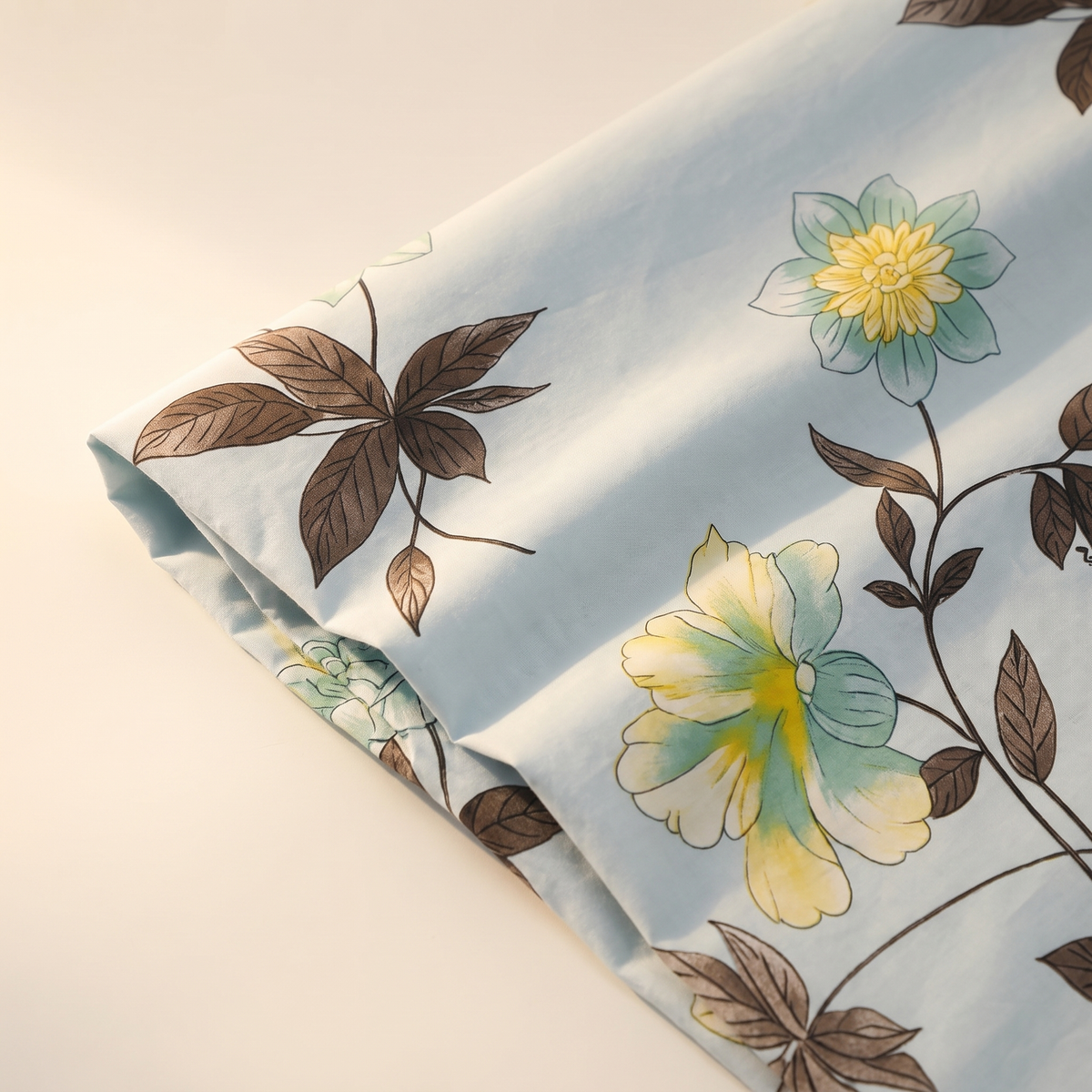 Azure Sheet Set, fold detail, yellow blooms on sky blue