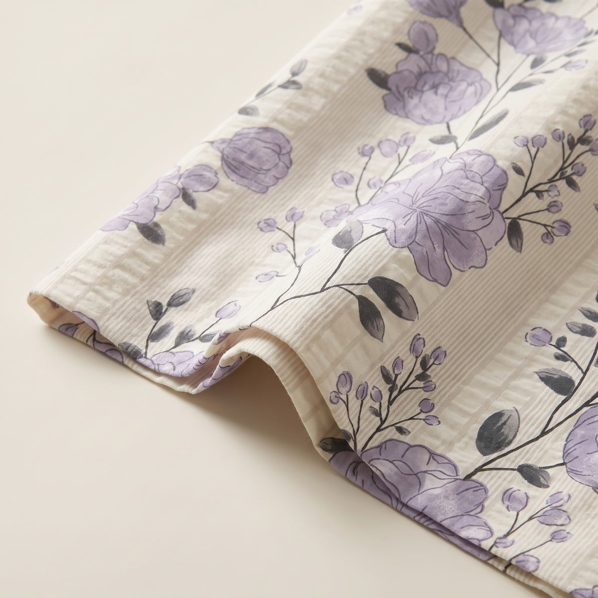Peony Sheet Set, fold detail, lilac peonies on ivory