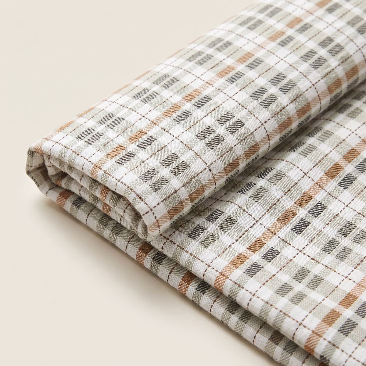 Saffron Sheet Set, fold detail, camel and cream gingham