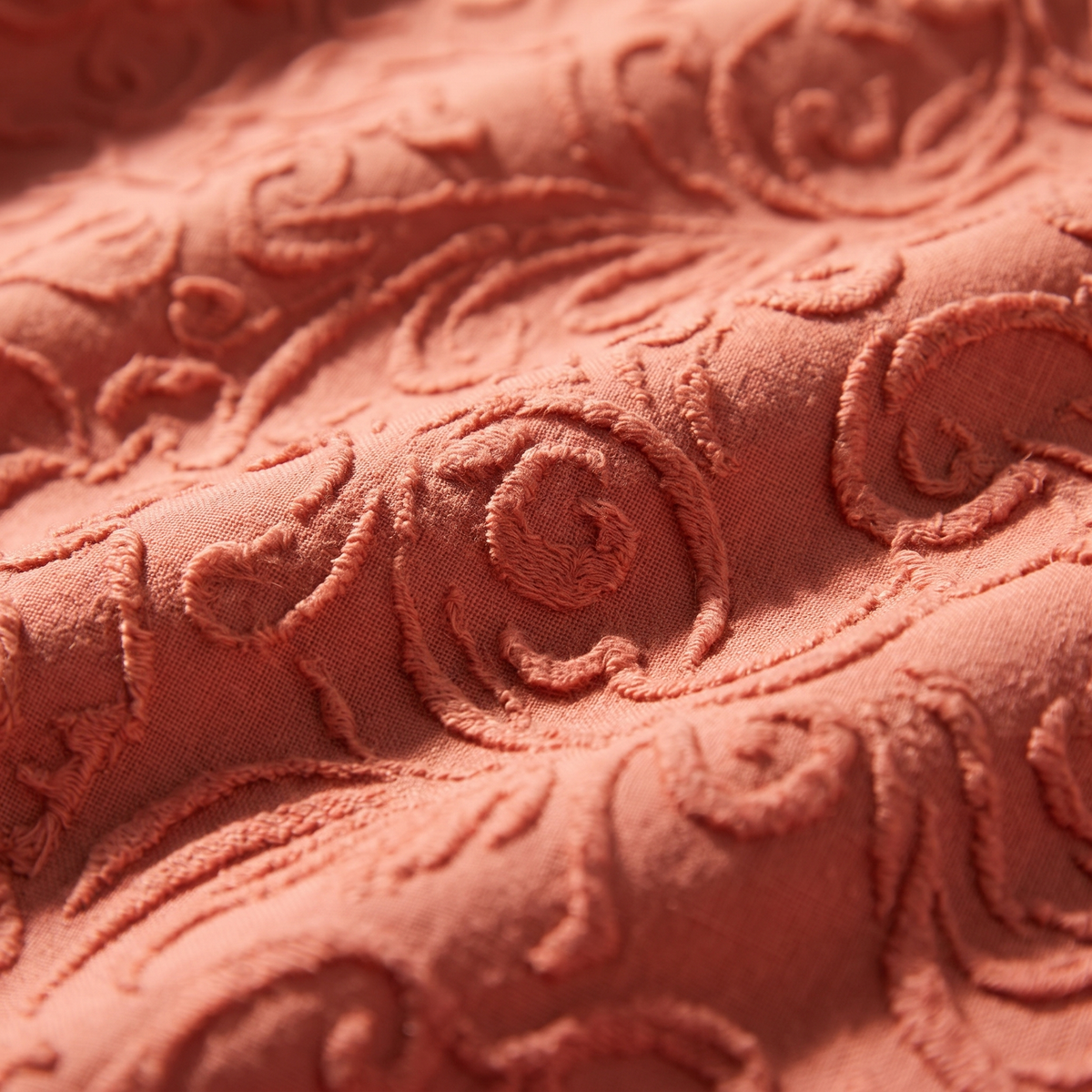 Coral Duvet Cover Set, fabric close-up, warm coral with a raised damask