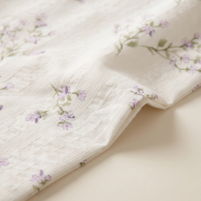 Lavender Sheet Set, fold detail, lavender sprigs on cream