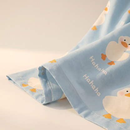 Puddle Sheet Set, fold detail, little ducks on pale blue
