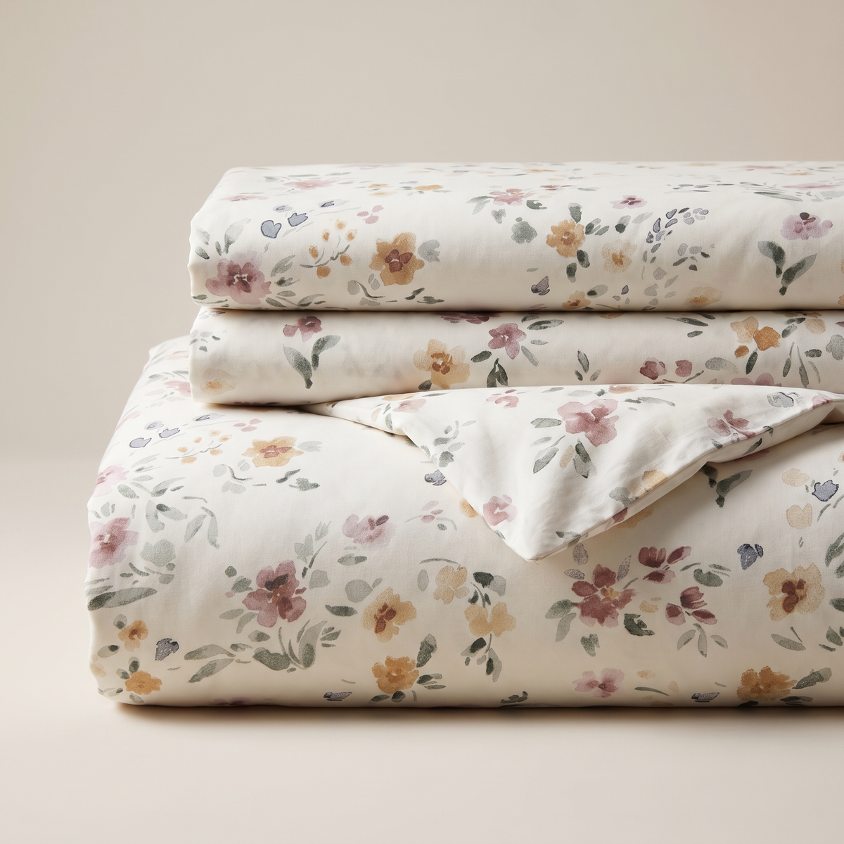 Meadow Duvet Cover Set, folded stack, watercolor wildflowers in rose and amber
