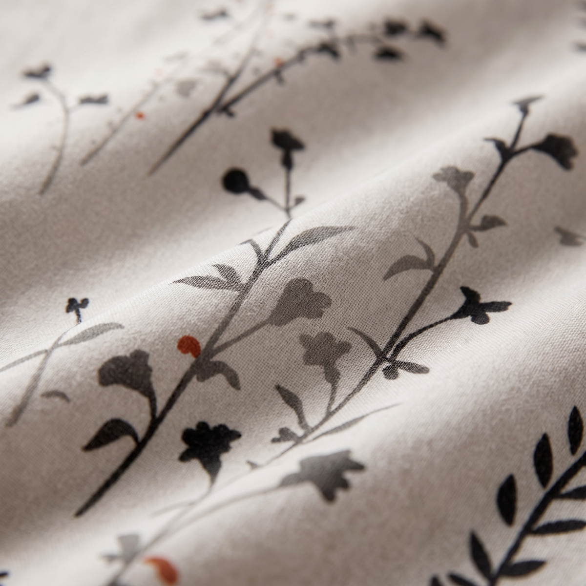 Willow Duvet Cover Set, fabric close-up, dark wildflower stems on warm stone