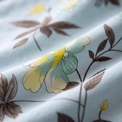 Azure Sheet Set, fabric close-up, yellow blooms on sky blue