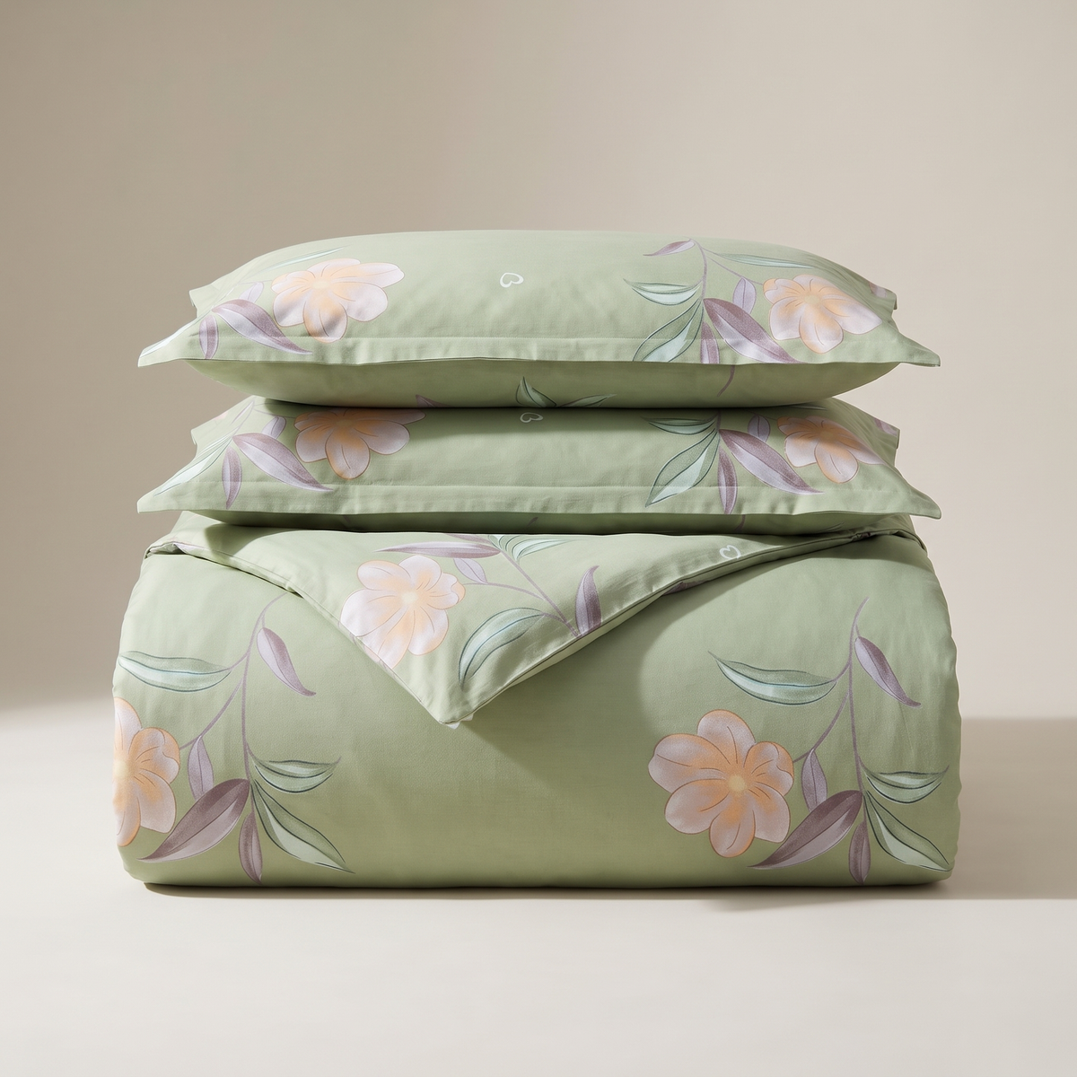 Lotus Duvet Cover Set, folded stack, pale pink lotus flowers on sage green