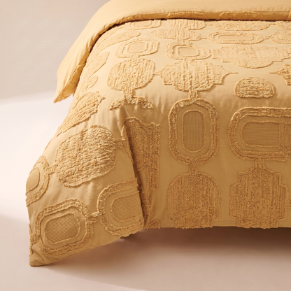 Honeycomb Duvet Cover Set, fold detail, honey gold with a raised honeycomb