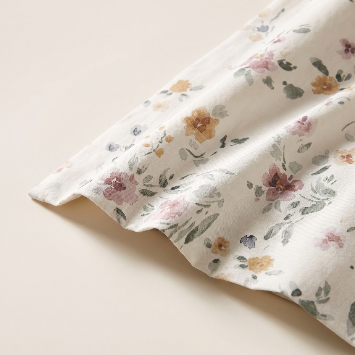 Meadow Duvet Cover Set, fold detail, watercolor wildflowers in rose and amber