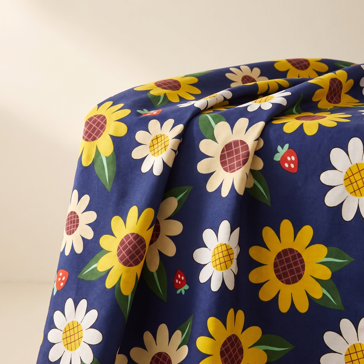 Sunny Duvet Cover Set, fold detail, sunflowers and daisies on navy