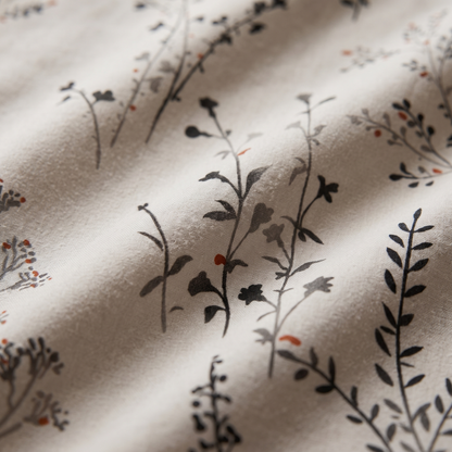 Willow Sheet Set, fabric close-up, dark wildflower stems on warm stone