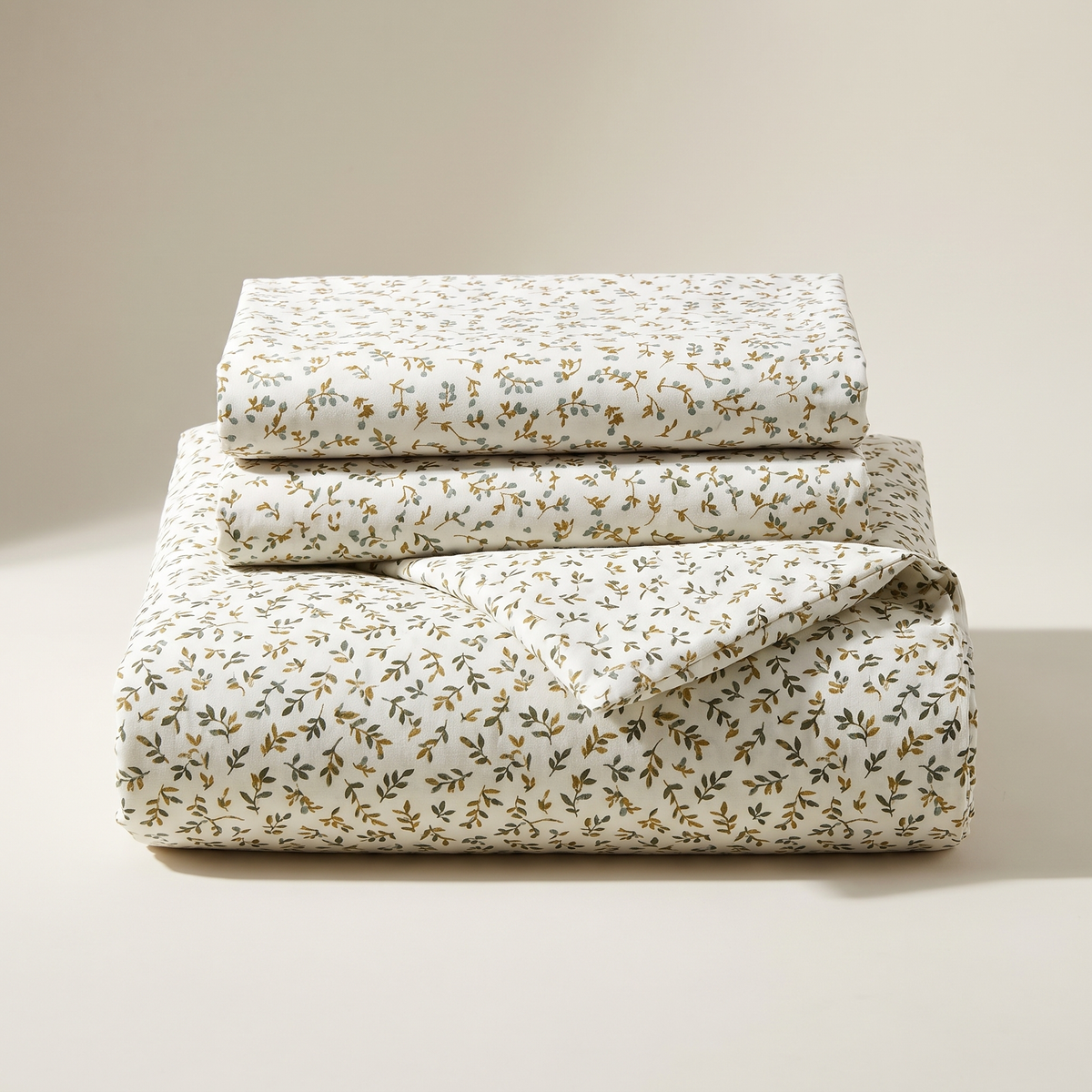 Olive Duvet Cover Set, folded stack, olive leaf print on ivory
