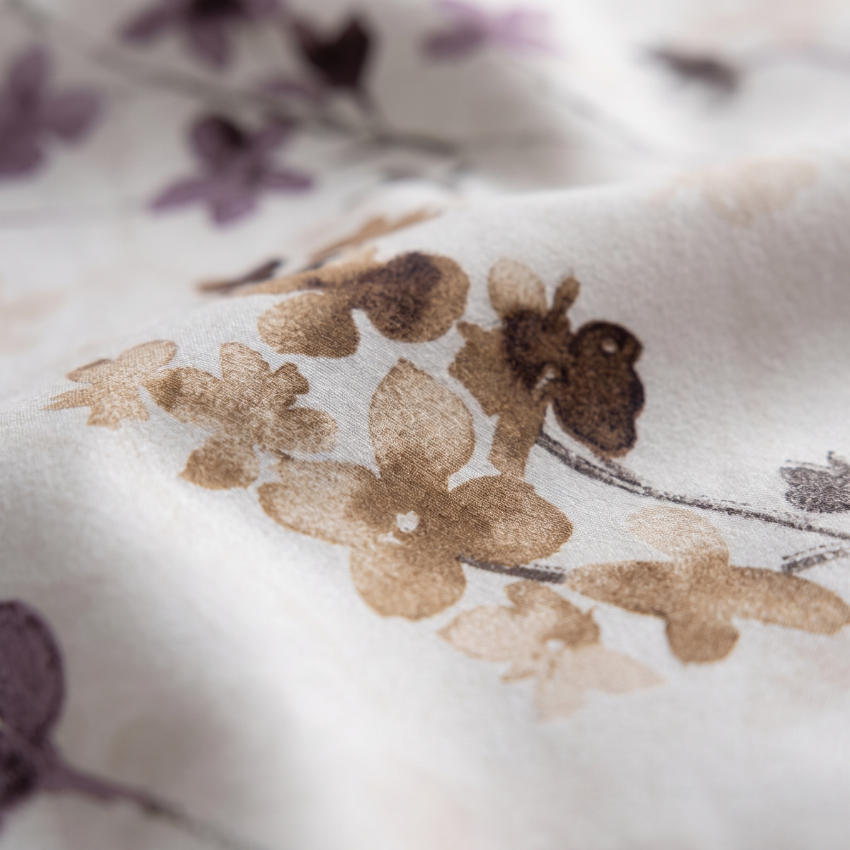 Blossom Sheet Set, fabric close-up, plum and mauve blossoms on cream