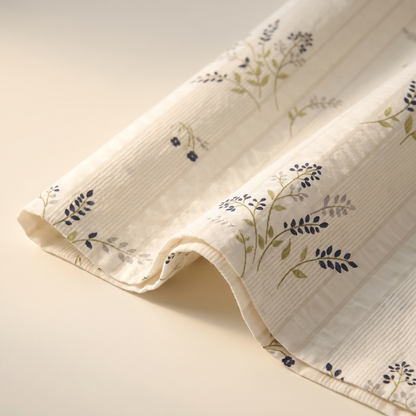 Heather Sheet Set, fold detail, thyme and heather in gray-green on cream