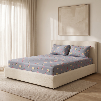 Amour Sheet Set, made bed, small roses and hearts on dusty blue