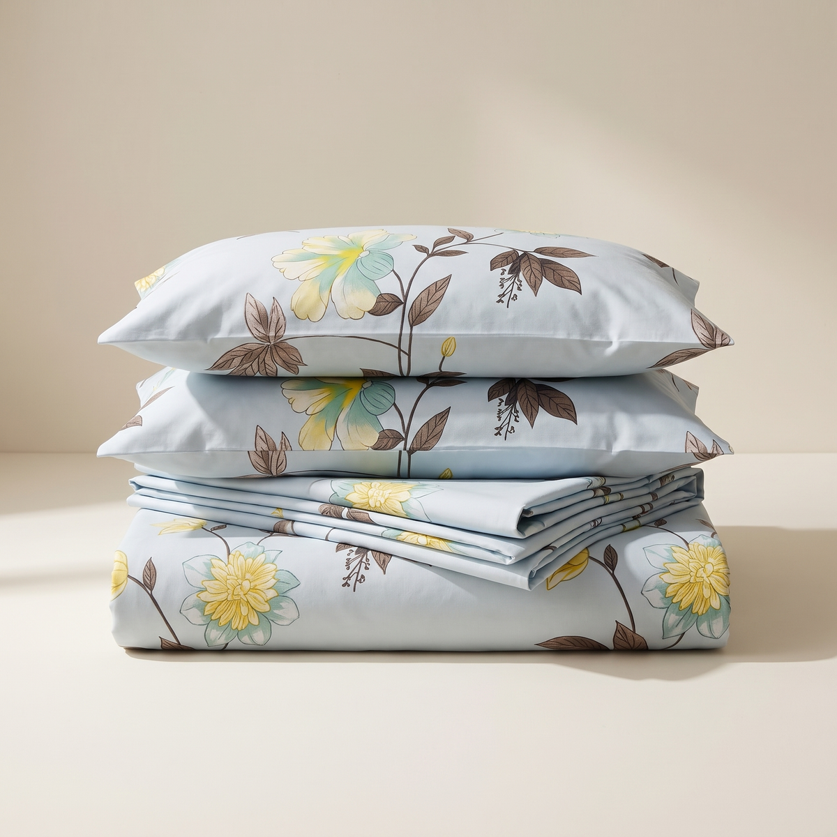 Azure Sheet Set, folded stack, yellow blooms on sky blue