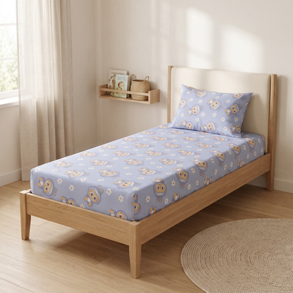 Burrow Sheet Set, made bed, rabbits and daisies on periwinkle