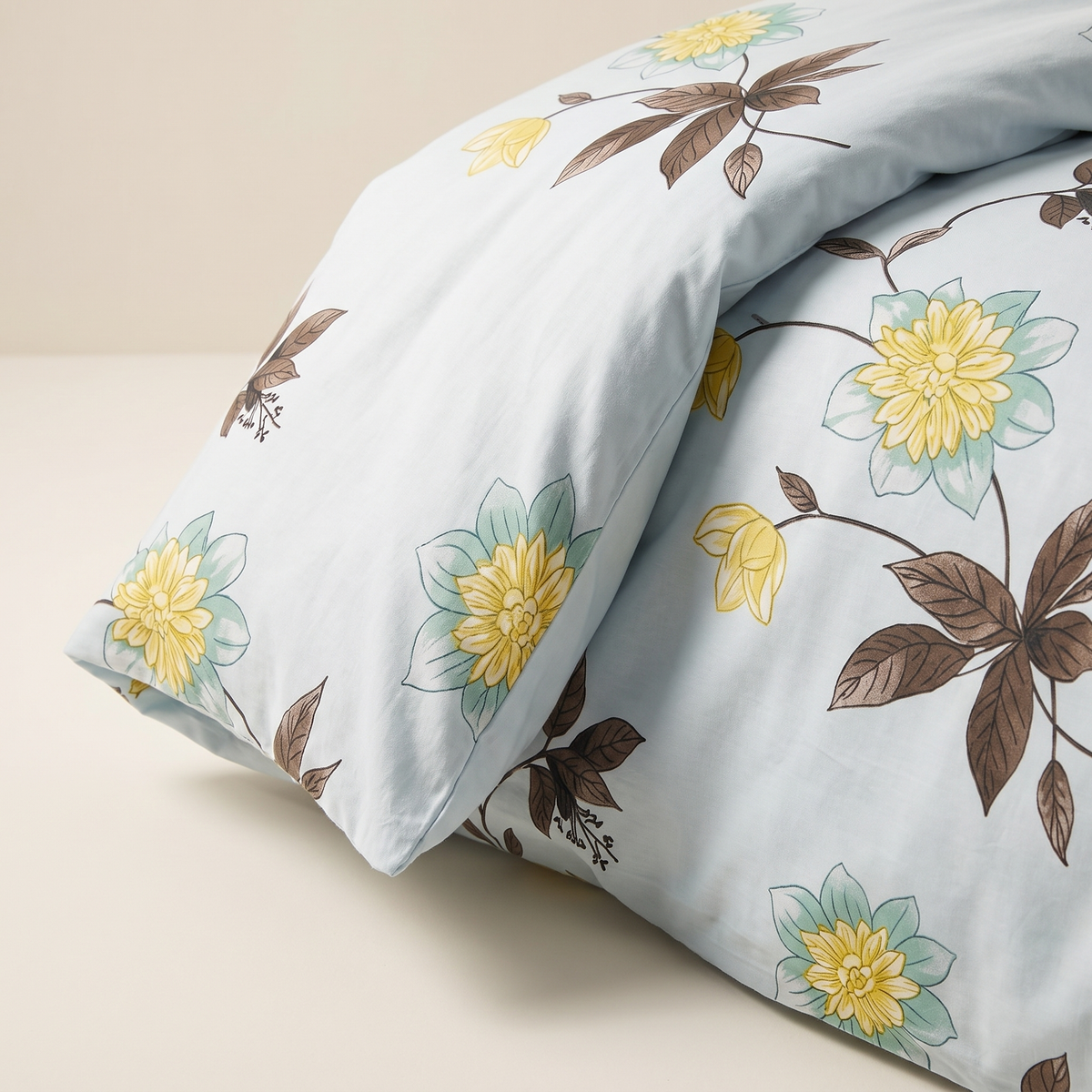 Azure Duvet Cover Set, fold detail, yellow blooms on sky blue