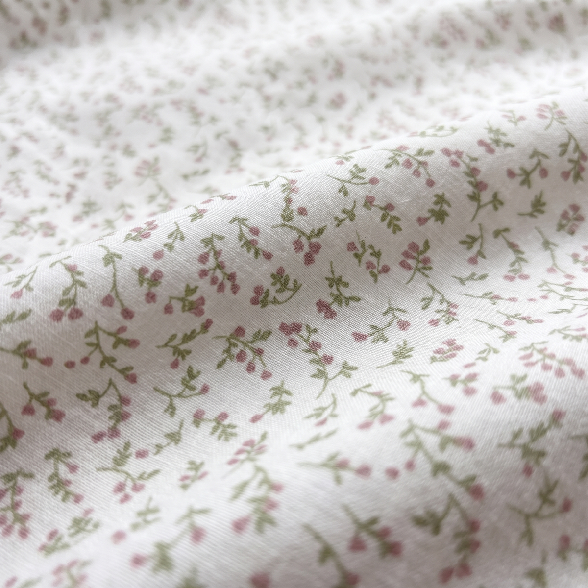 Fern Sheet Set, fabric close-up, tiny sprigs on cream