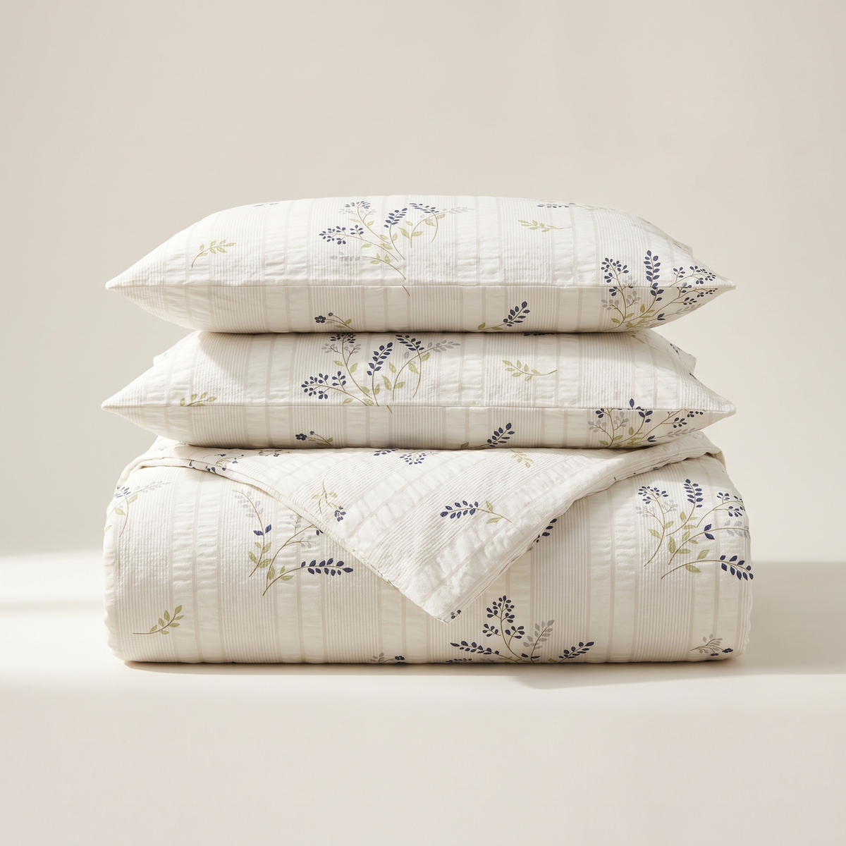 Heather Duvet Cover Set, folded stack, thyme and heather in gray-green on cream