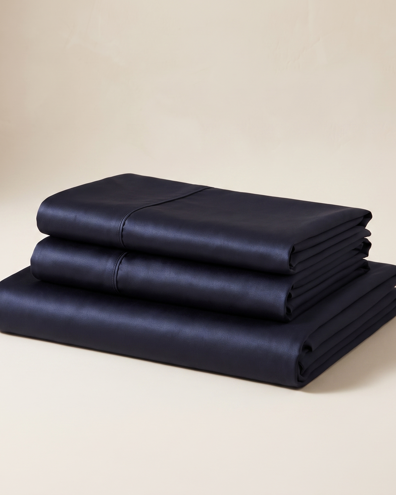 Midnight Satin Sheet Set, folded stack