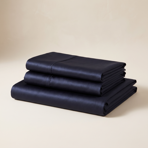 Midnight Satin Sheet Set — folded stack