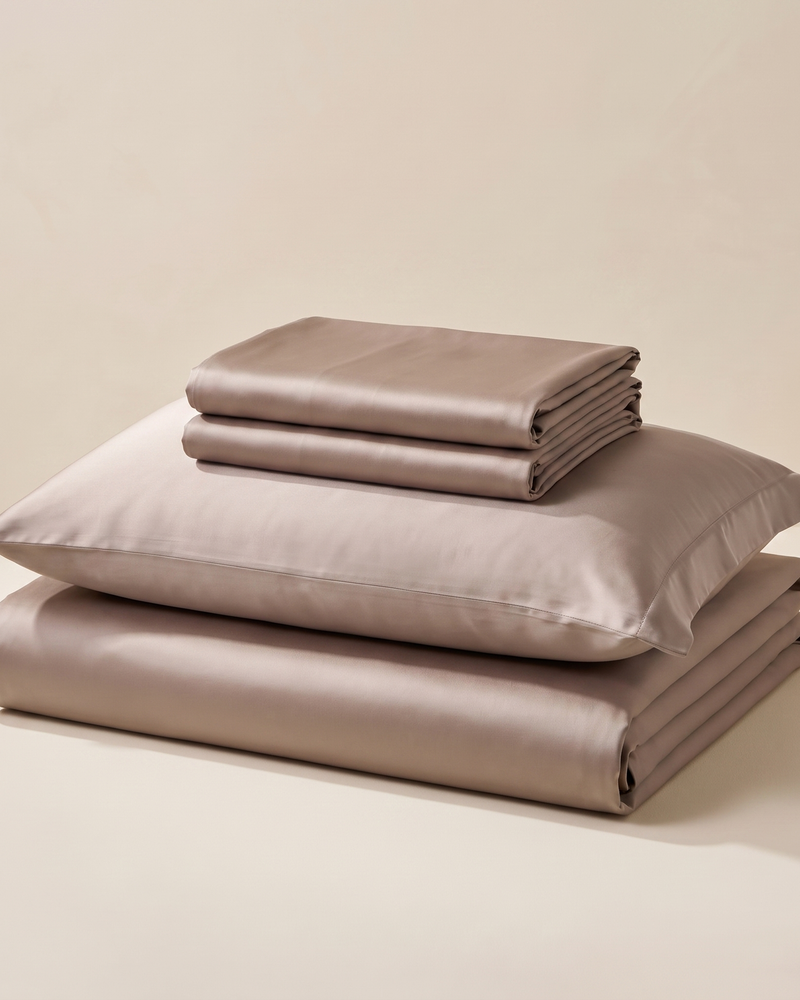 Almond Satin Sheet Set, folded stack