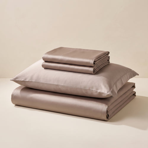 Almond Satin Sheet Set — folded stack
